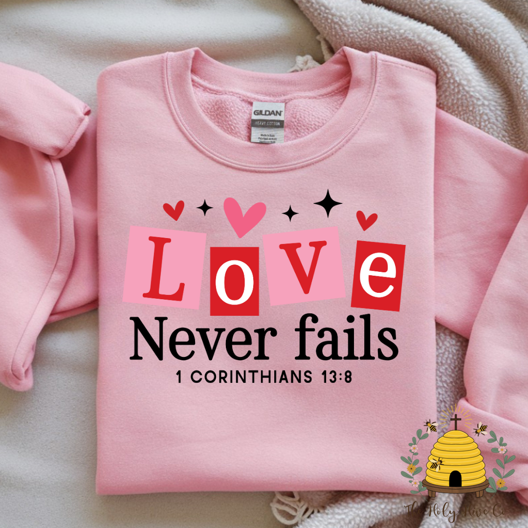 Love Never Fails Adult Graphic Shirt