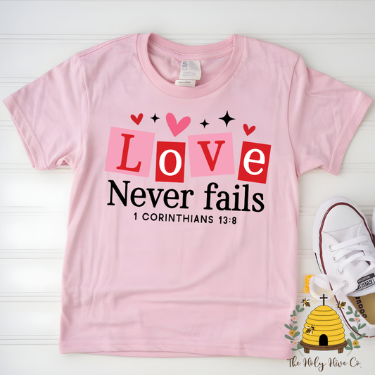 Love Never Fails Kids Graphic Shirt